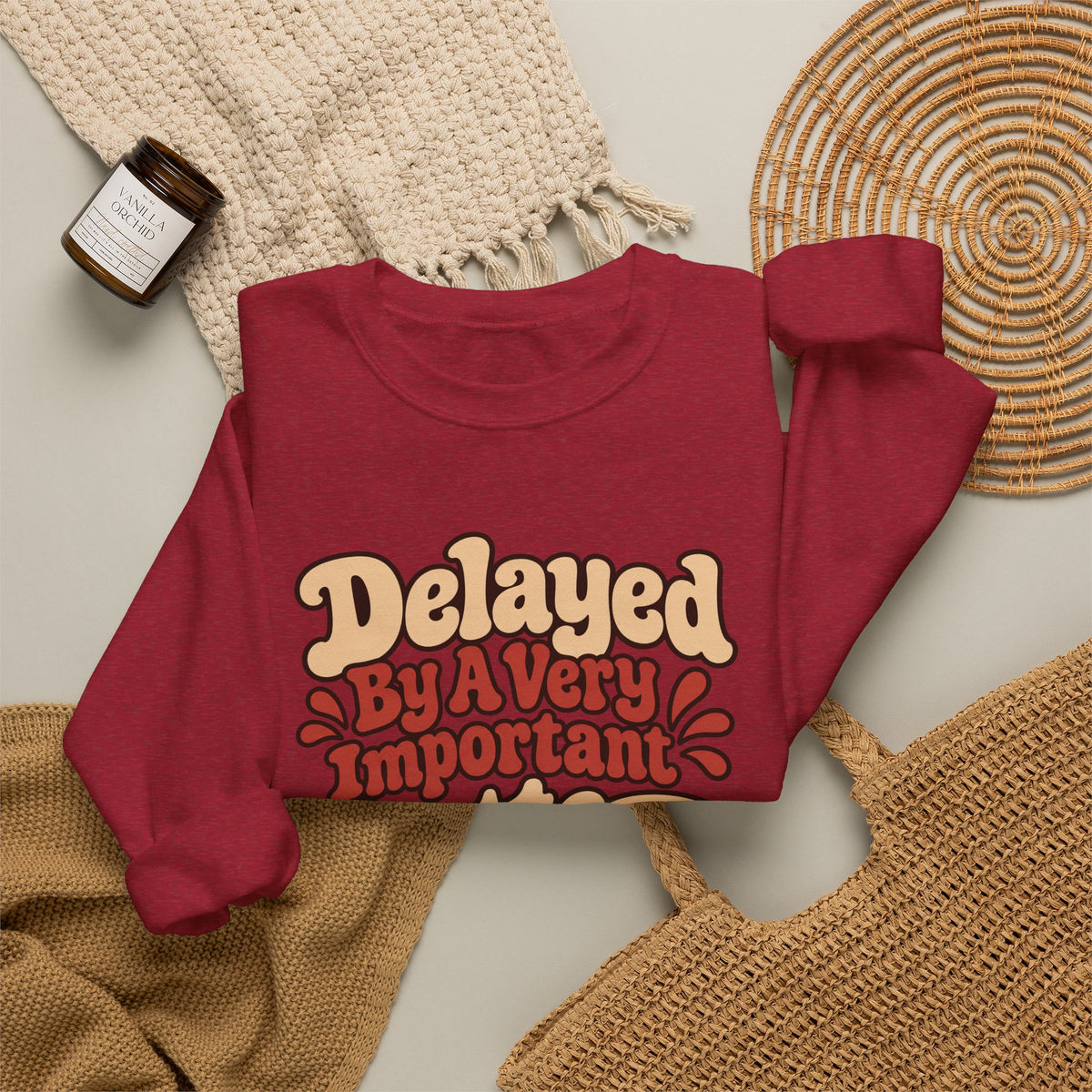 Latte Delay Retro Sweatshirt in red, folded front view with printed design