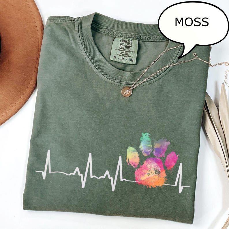 Moss T-shirt with a rainbow paw print and white heartbeat line