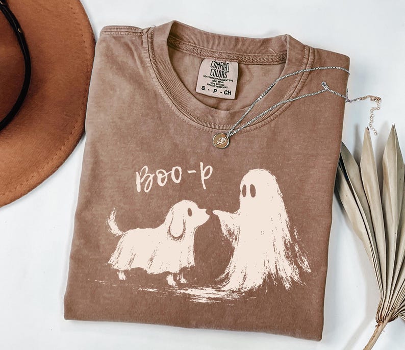 Espresso T-shirt with a dog and ghost touching noses beneath Boo-p lettering