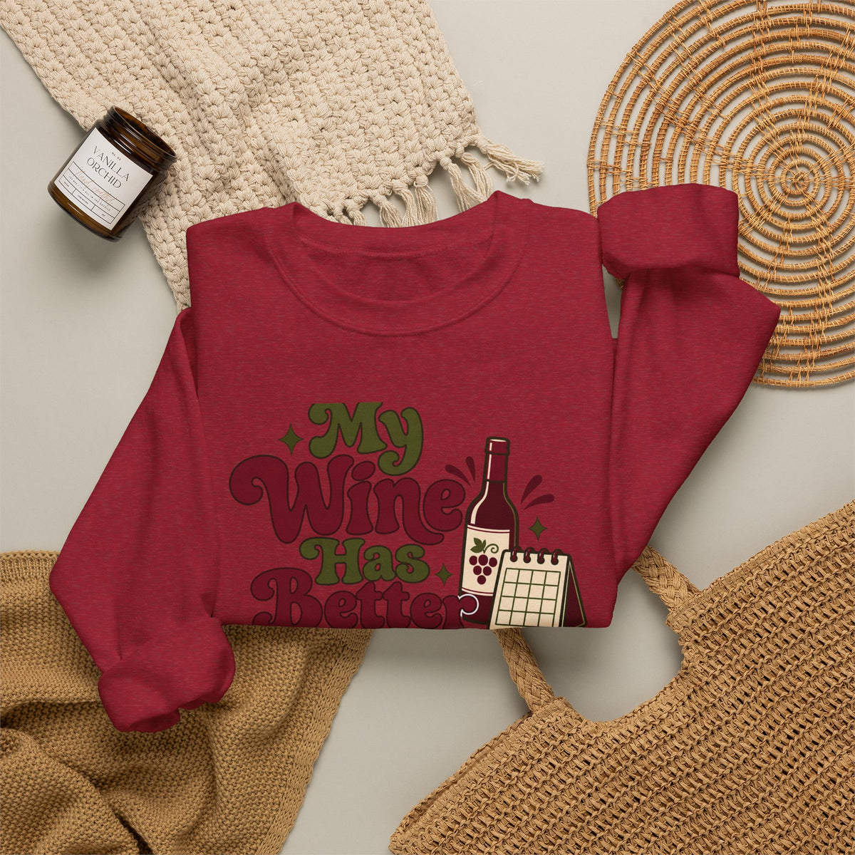 Weekend Wine Plans Sweatshirt in red, folded front view with printed design