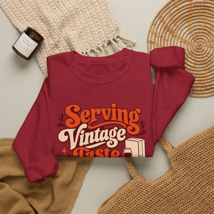 Boxed Budget Wine Sweatshirt in red, folded front view with printed design
