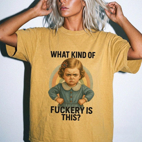 Mustard T-shirt with an angry retro-style girl and sarcastic black lettering.