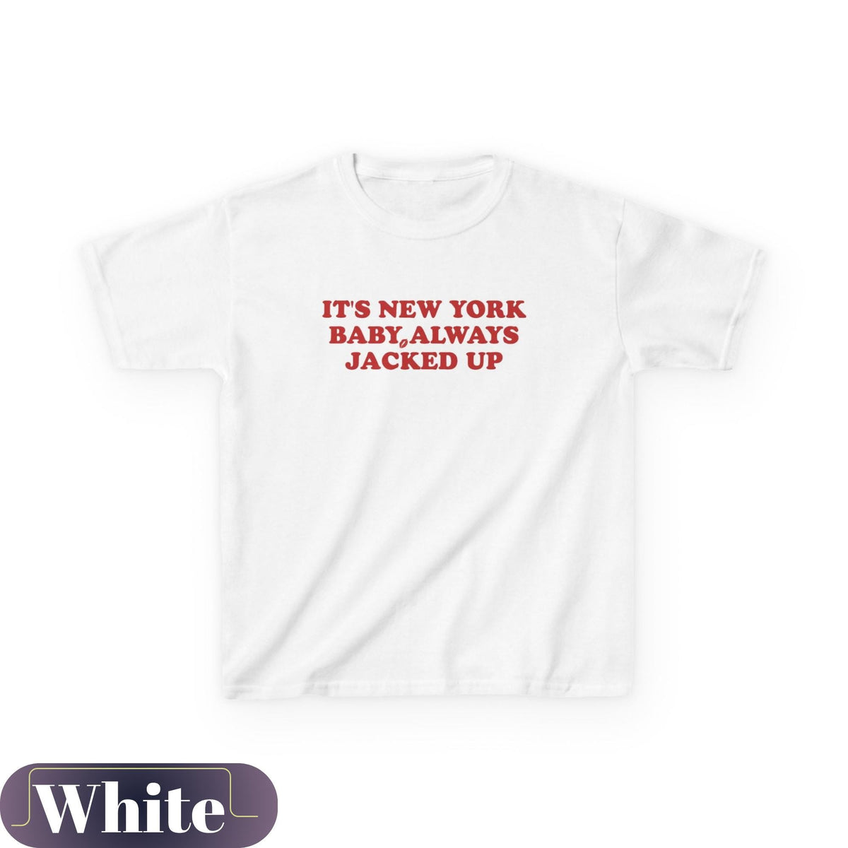 White baby tee with red It's New York Baby, Always Jacked Up lettering.