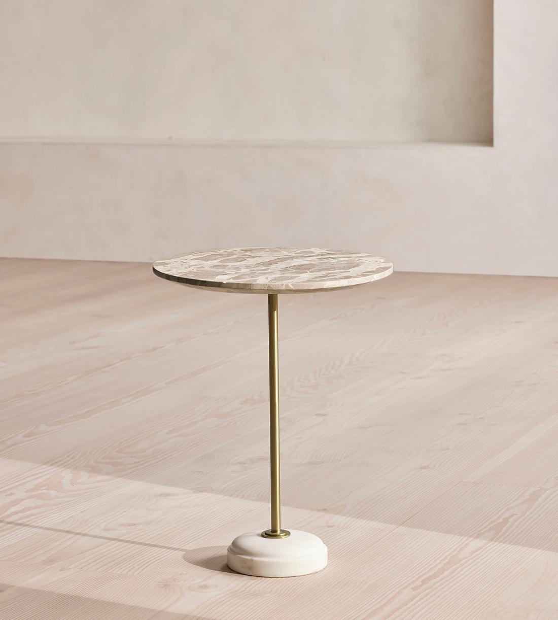 Fleet medium side table with a round Kapri marble top, antique brass stem and white marble base