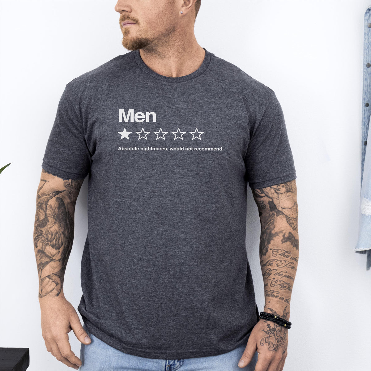 Dark heather T-shirt with Men lettering, one filled star and a sarcastic review phrase