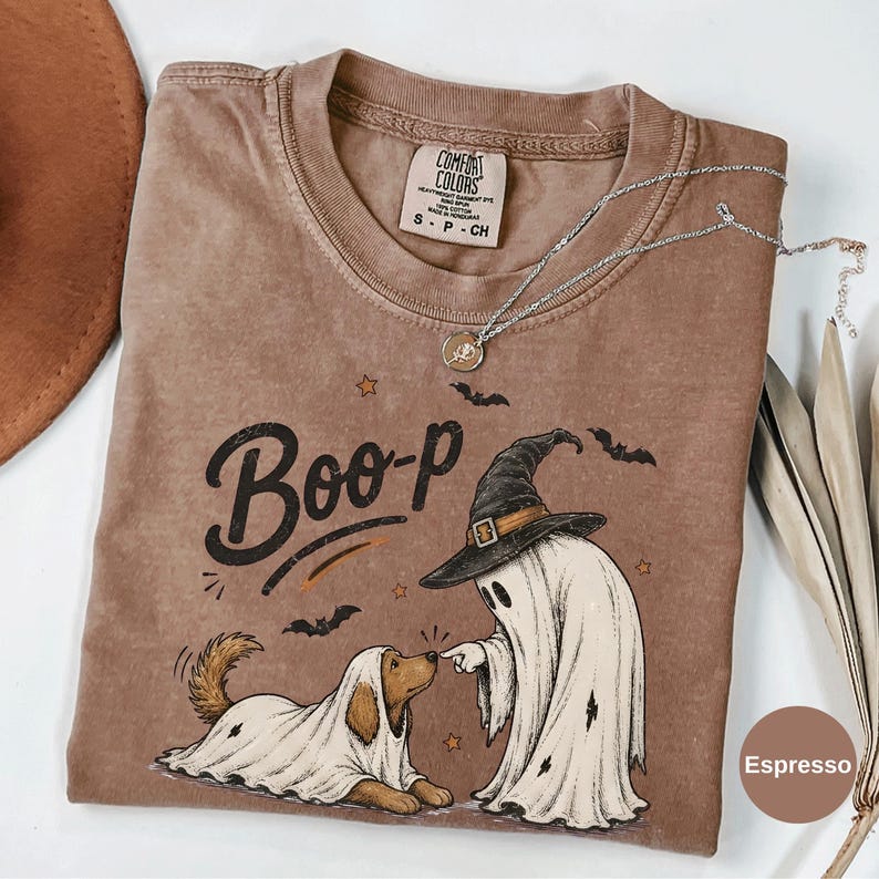 Espresso T-shirt with a witch ghost touching a costumed dog’s nose