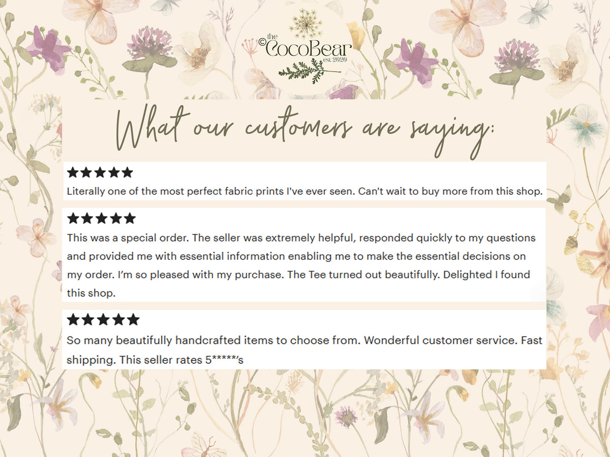 May include: Image featuring customer reviews for a shop called "The CocoBear." The reviews are displayed on a floral background with text that reads "What our customers are saying." The reviews praise the fabric prints and customer service.