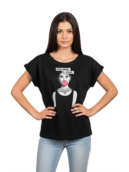 May include: Black t-shirt featuring a graphic of a woman with a bubblegum bubble and the text "BEING NORMAL IS BORING". The shirt has short sleeves and a round neckline. The woman is wearing a black dress and a pearl necklace.