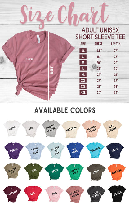 May include: A size chart for an adult unisex short sleeve tee featuring a mauve t-shirt with chest and length measurement lines. A table lists sizes XS to 4XL with corresponding measurements in inches. Below, a grid displays 24 available color options.