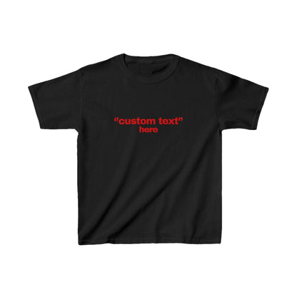 May include: Black t-shirt with the red text "custom text" above "here". The short-sleeved shirt is made of a soft material and is suitable for casual wear. The text is centered on the front of the shirt.