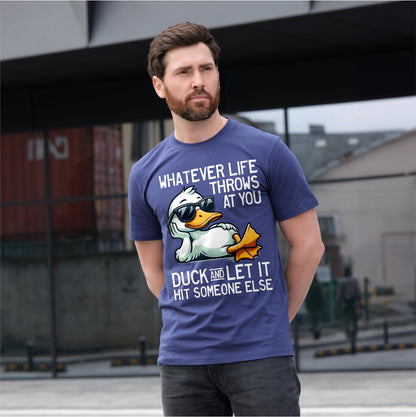 May include: Navy blue t-shirt featuring a cartoon duck wearing sunglasses and the text "WHATEVER LIFE THROWS AT YOU DUCK AND LET IT HIT SOMEONE ELSE". The duck is white with a yellow beak and feet.