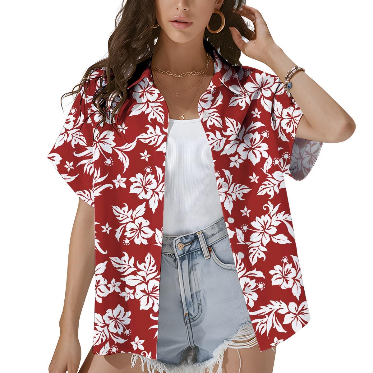 May include: Red Hawaiian shirt with a white floral pattern. The short-sleeved shirt has a button-down front and a classic collar. The shirt is open, revealing a white tank top and denim shorts.