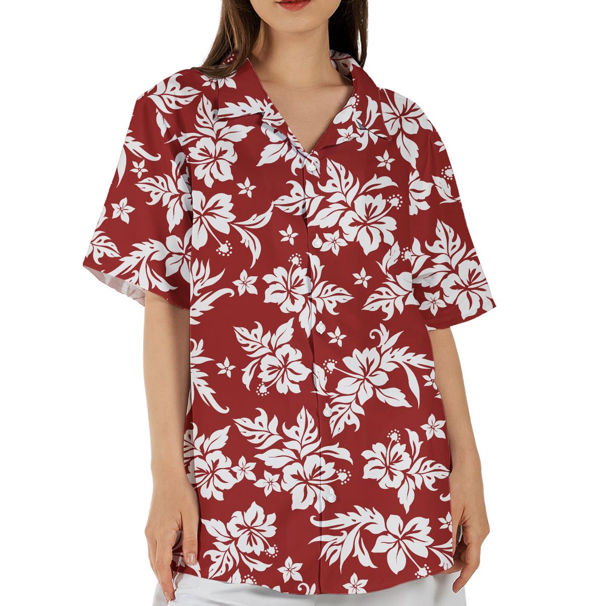 May include: A short-sleeved, button-down shirt in a deep red hue, adorned with a repeating pattern of large white hibiscus flowers and smaller floral accents. The shirt has a classic collar and a relaxed fit, suitable for casual wear.