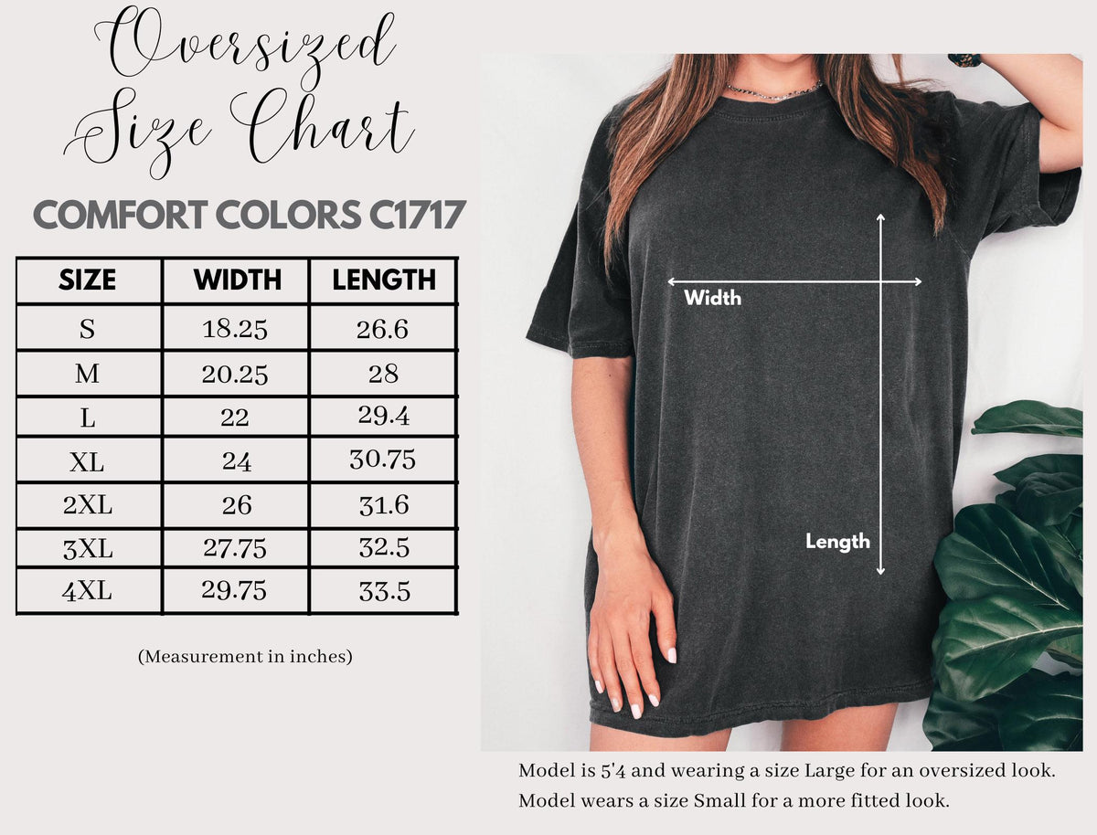 May include: An oversized Comfort Colors C1717 t-shirt size chart with a table listing sizes S through 4XL with corresponding width and length measurements in inches. The image displays a dark grey t-shirt with white arrows indicating width and length.