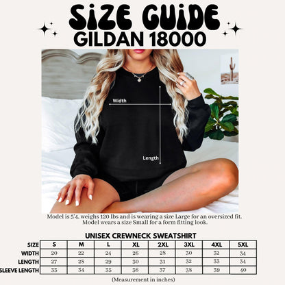 May include: A black Gildan 18000 unisex crewneck sweatshirt size guide featuring a chart with width, length, and sleeve length measurements in inches. The graphic displays a visual diagram of a sweatshirt with width and length labels.