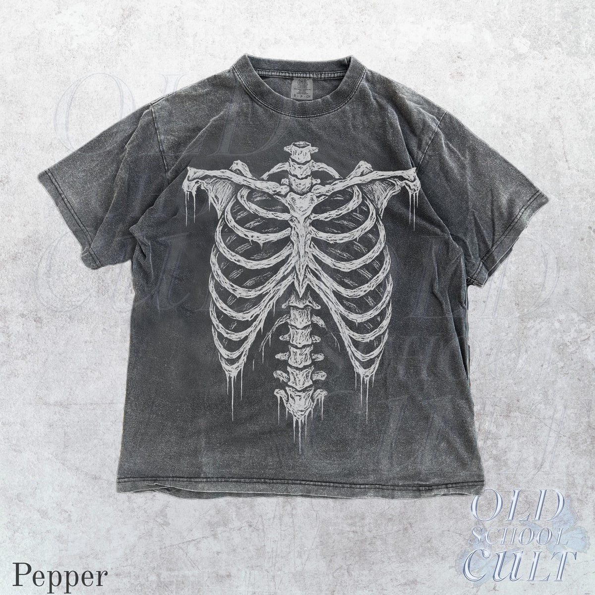May include: Pepper-colored t-shirt featuring a white skeletal rib cage design. The graphic tee has a vintage, distressed look. The text "OLD SCHOOL CULT" is printed in white on the bottom right corner.