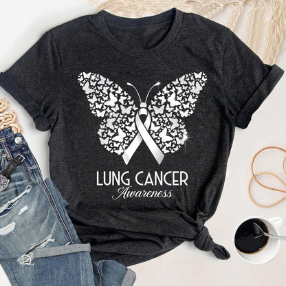 May include: Dark gray t-shirt featuring a white butterfly design composed of smaller butterflies. A white ribbon is centered within the butterfly, with the words "LUNG CANCER Awareness" printed below in white script.