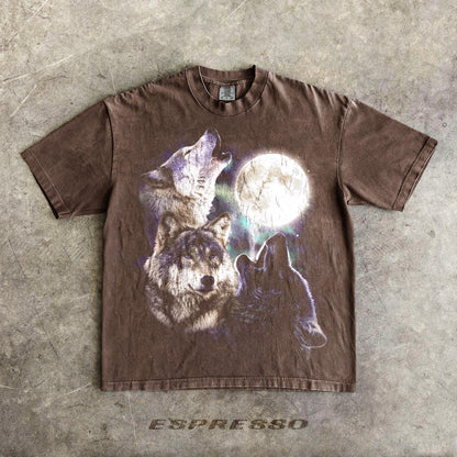 May include: Espresso-colored t-shirt featuring a graphic of three wolves howling at a full moon. The design includes shades of purple and white, with the word "ESPRESSO" printed at the bottom.
