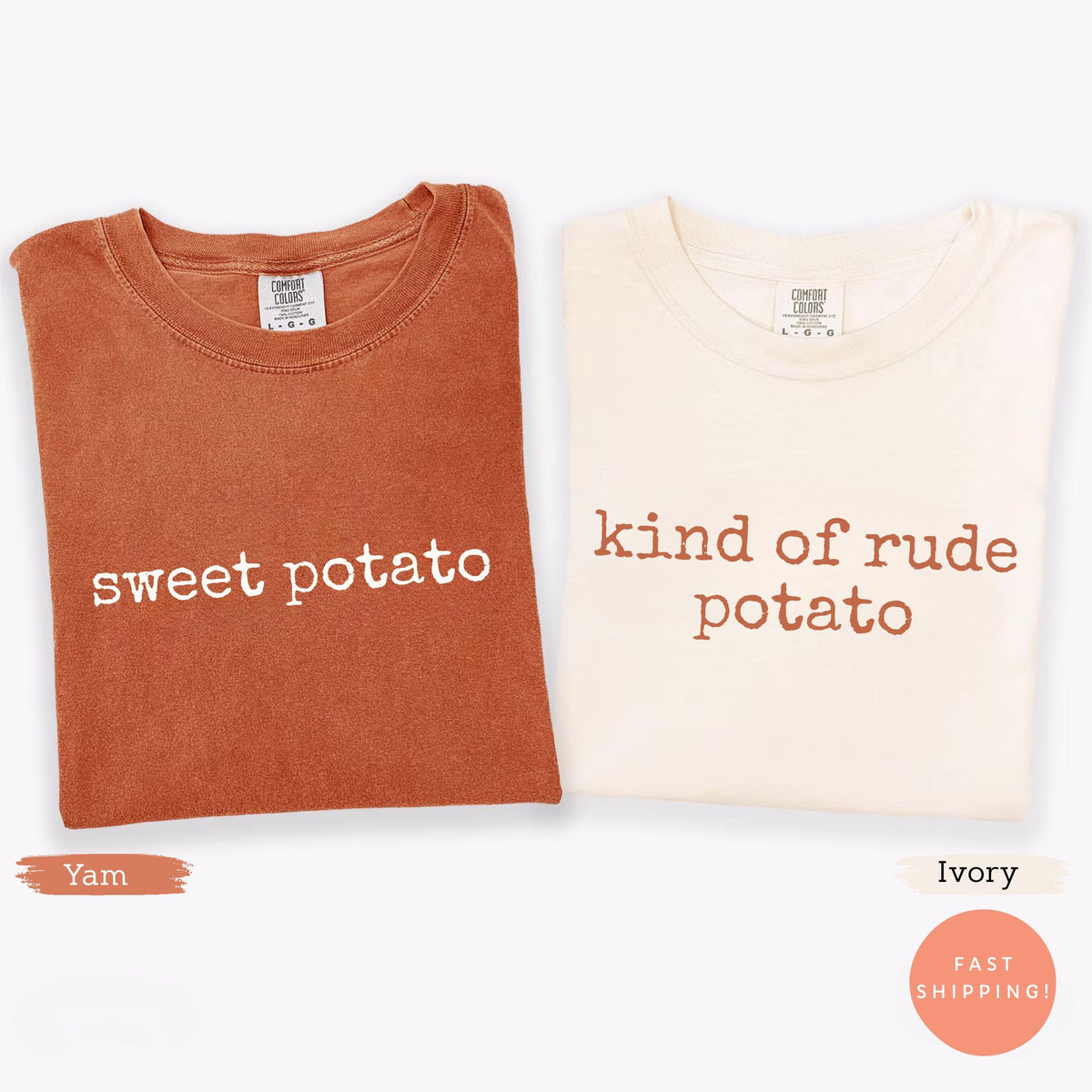 May include: Two folded t-shirts, one burnt orange and one ivory. The burnt orange shirt reads "sweet potato" in white text. The ivory shirt reads "kind of rude potato" in brown text. Both shirts have a crew neck.