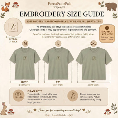 May include: An embroidery size guide from Forest Fable Pals. The guide shows three olive green t-shirts in sizes M, L, and 2XL, with the shirt widths labeled. The guide states the embroidery is approximately 3" wide on all shirt sizes.