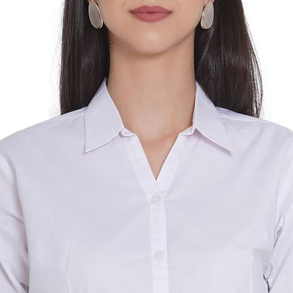 May include: A crisp white button-down shirt featuring a classic pointed collar and a V-neckline. The shirt is made of a smooth, solid white fabric and includes a vertical row of matching white buttons down the center front of the garment.
