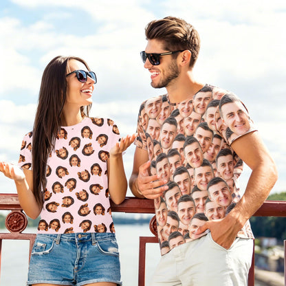 May include: A light pink short-sleeved t-shirt featuring a repeating pattern of a woman's face and a white short-sleeved t-shirt featuring a repeating pattern of a man's face, both worn with blue denim shorts and light-colored trousers.