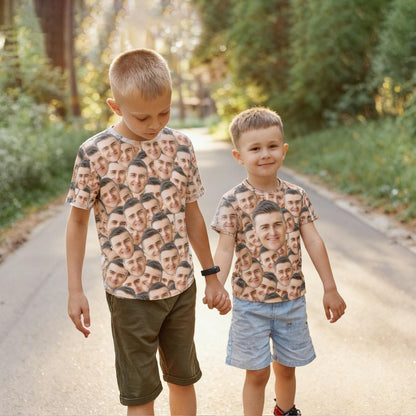 May include: Two short-sleeved crew neck t-shirts featuring an all-over repeating photo print of a man's face. The shirts are worn with olive green shorts and light blue denim shorts, respectively, and have a standard fit with a straight hemline.