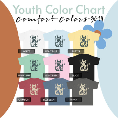 May include: A Youth Color Chart for Comfort Colors 9018 t-shirts displaying nine shirts in white, light blue, butter, island reef, light pink, black, crimson, blue jean, and pepper. Each shirt features a graphic of a cat playing an electric guitar.
