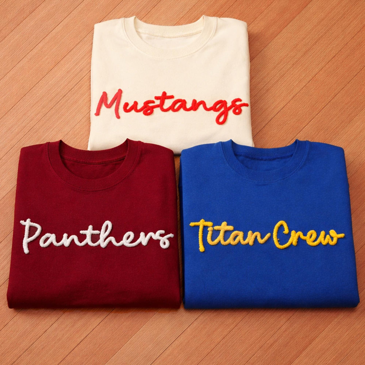 May include: A set of three ceramic nesting bowls in shades of blue, green, and white. The bowls feature a speckled glaze and a simple, modern design. The largest bowl is approximately 6 inches in diameter.