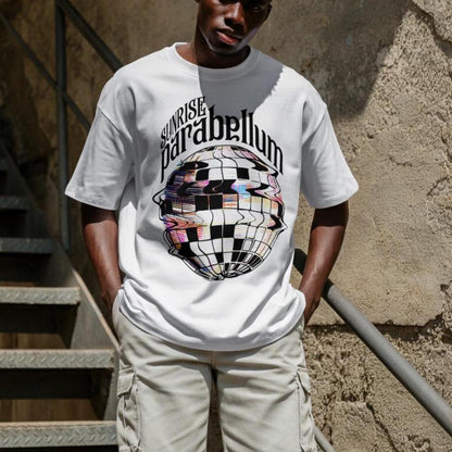 May include: A white short-sleeved t-shirt featuring a graphic print of a distorted disco ball with the text "SUNRISE parabellum" arched above it. The design incorporates black, white, and subtle iridescent colors in a wavy, glitch-like pattern.