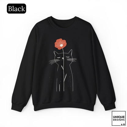May include: A black long-sleeve sweatshirt featuring a white line art illustration of a cat with closed eyes. A single orange-red flower is positioned above the cat's head, with its stem extending downward. The text Black appears in the top left corner.