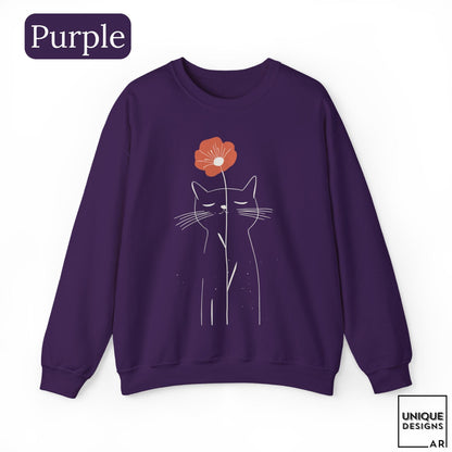 May include: A purple long-sleeve sweatshirt featuring a white line art illustration of a cat with closed eyes. A single orange flower is positioned above the cat's head. The text "Purple" appears in the top left corner and "UNIQUE DESIGNS" in the bottom right.