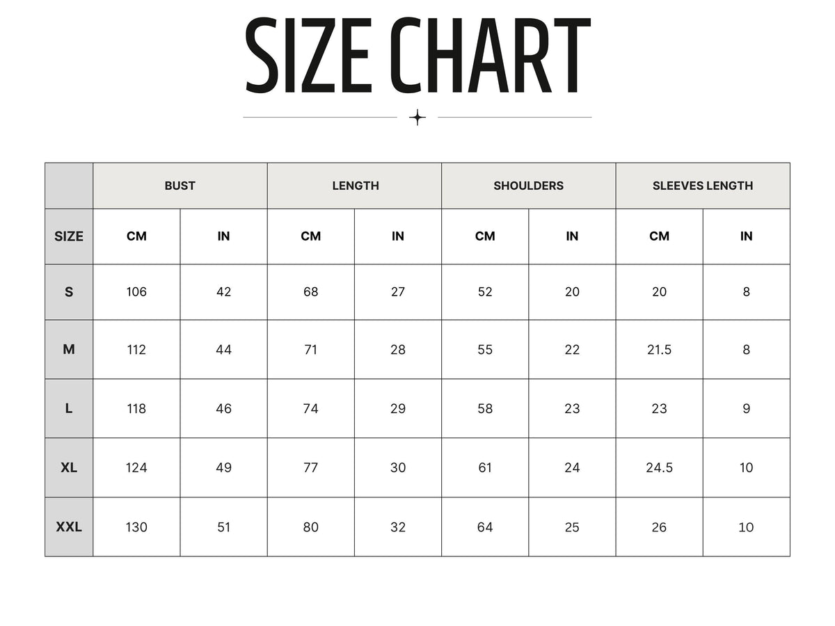 May include: A size chart with measurements in inches and centimeters. The chart includes bust, length, shoulders, and sleeve length measurements for sizes S, M, L, XL, and XXL. The chart shows the measurements in inches and centimeters.