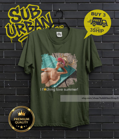 May include: Olive green t-shirt featuring a graphic of a person sunbathing with sunglasses and the text "I f*ching love summer!". The shirt also has the text "etsy.com/shop/SubUrbanShop3".