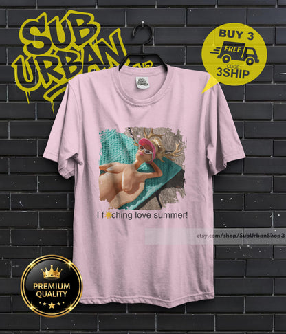 May include: Light pink t-shirt featuring a graphic of a person wearing sunglasses and a hat, with the text "I f*ching love summer!". The shirt also has the Etsy shop URL and a "Premium Quality" badge.