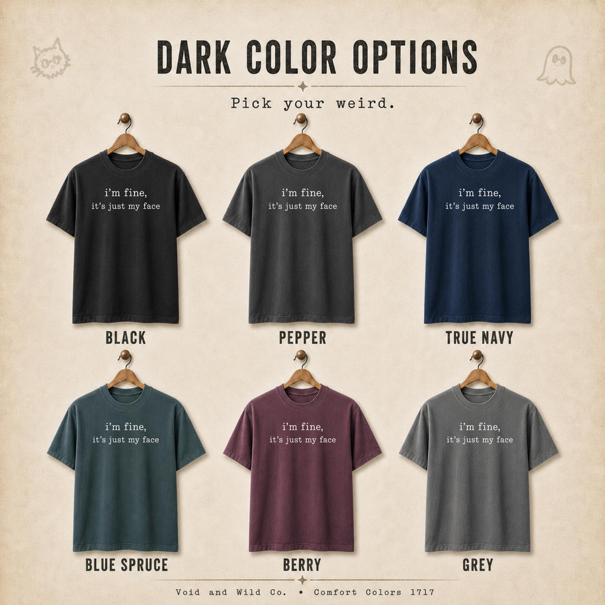 May include: Six short-sleeve t-shirts in black, pepper, true navy, blue spruce, berry, and grey. Each shirt features the white text 'i'm fine, it's just my face' centered on the chest. The image includes the text 'DARK COLOR OPTIONS' and 'Pick your weird.'