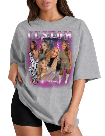 May include: A heather gray t-shirt featuring a graphic print with the word CUSTOM in large pink letters. The design includes a collage of five photographs of a person in various outfits against a purple background with lightning bolt accents.