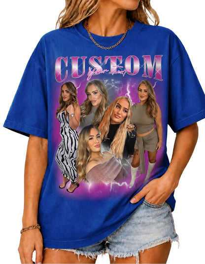 May include: A royal blue short-sleeve t-shirt featuring a graphic print with the text "CUSTOM Your Text" in a metallic font. The design includes multiple photographic portraits of a person against a purple lightning background.