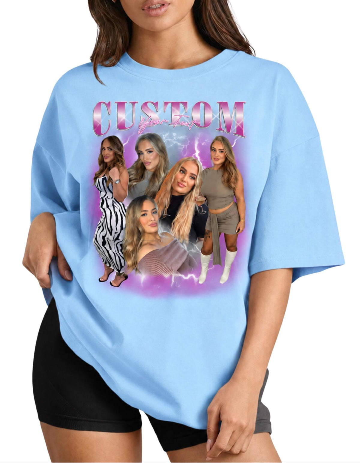 May include: A light blue t-shirt featuring a graphic print with the word CUSTOM in pink metallic lettering. The design includes a collage of five photographs of the same person in various outfits, set against a purple lightning background.