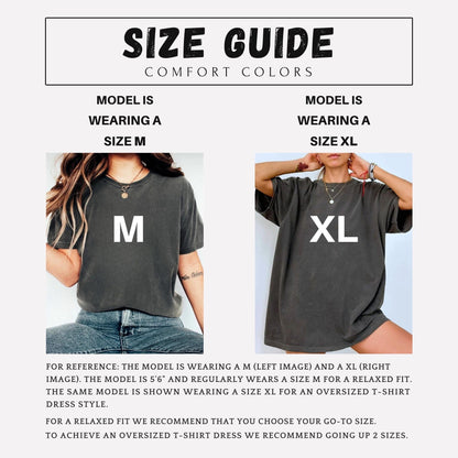 May include: A size guide for Comfort Colors t-shirts featuring two images. The left image shows a charcoal t-shirt in size M, and the right image shows the same t-shirt in size XL. Text includes SIZE GUIDE, COMFORT COLORS, MODEL IS WEARING A SIZE M, and MODEL IS WEARING A SIZE XL.