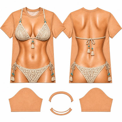 May include: A tan short-sleeved t-shirt featuring a realistic print of a person wearing a beige crochet bikini. The design includes intricate knit patterns, braided straps, and small turquoise and wooden beads on the ties and tassels.
