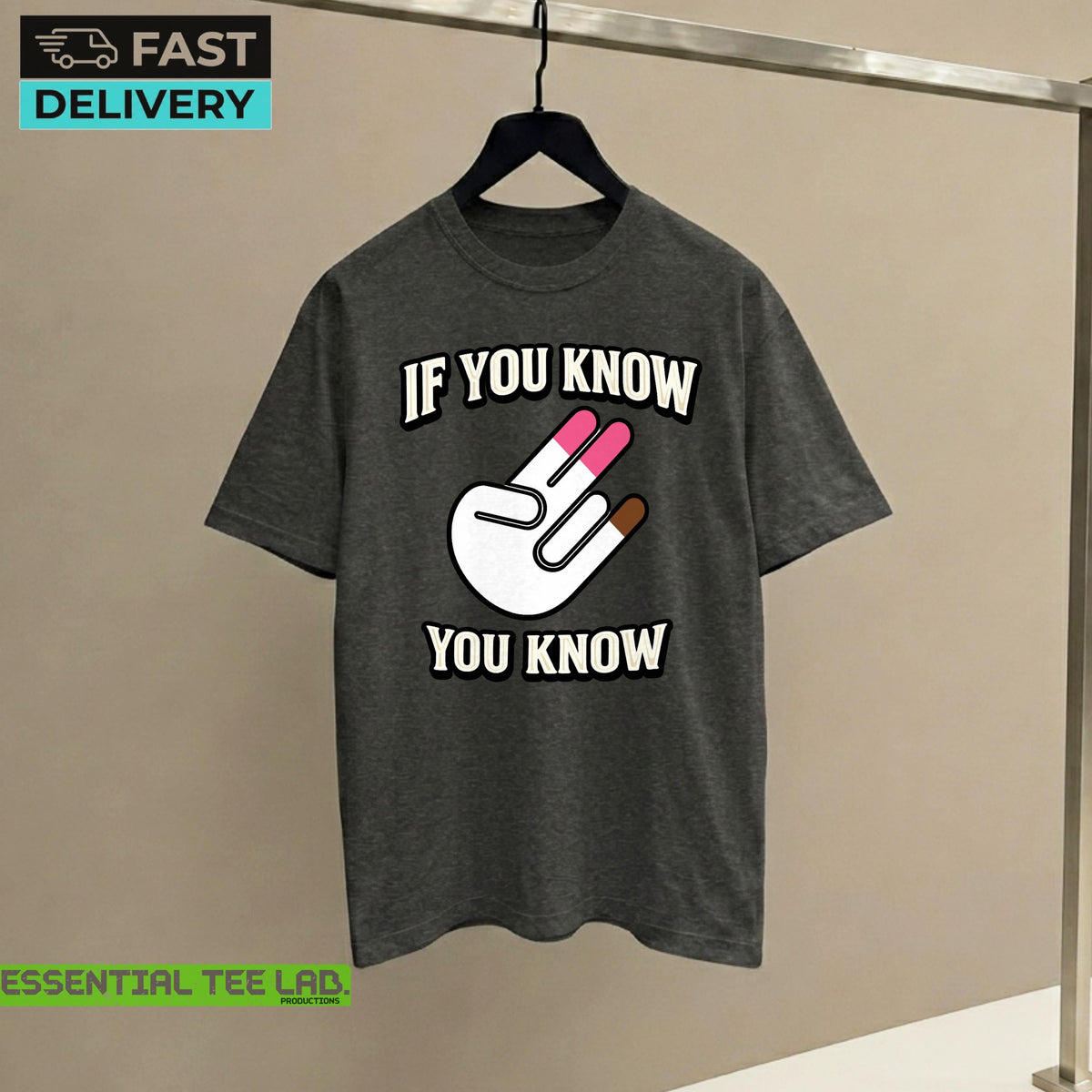 May include: A dark gray short-sleeve t-shirt featuring a graphic of a white hand making a two-finger gesture with pink and brown tips. The text "IF YOU KNOW" is printed in white above the hand, and "YOU KNOW" is printed in white below the hand.