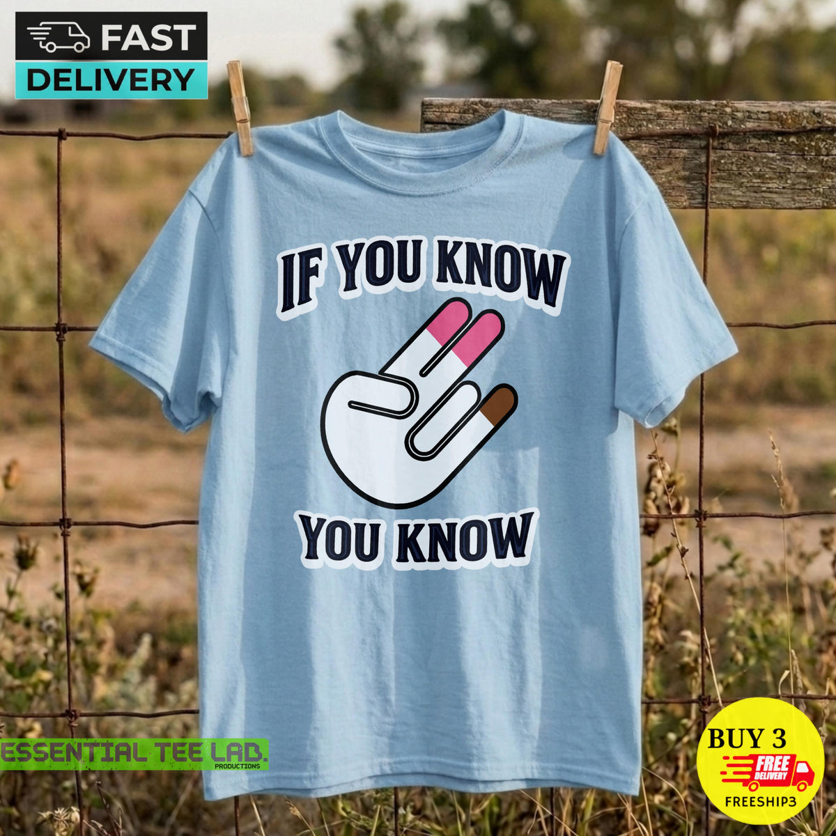 May include: A light blue short-sleeve t-shirt featuring a graphic of a white hand making a two-finger gesture with pink and brown tips. The text "IF YOU KNOW" is printed above the hand and "YOU KNOW" is printed below in dark blue lettering.