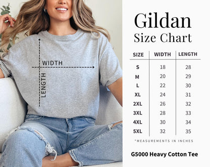 May include: A grey short-sleeve t-shirt with a size chart titled Gildan Size Chart. The chart lists sizes S through 5XL with corresponding width and length measurements in inches. The shirt features a graphic overlay indicating width and length.