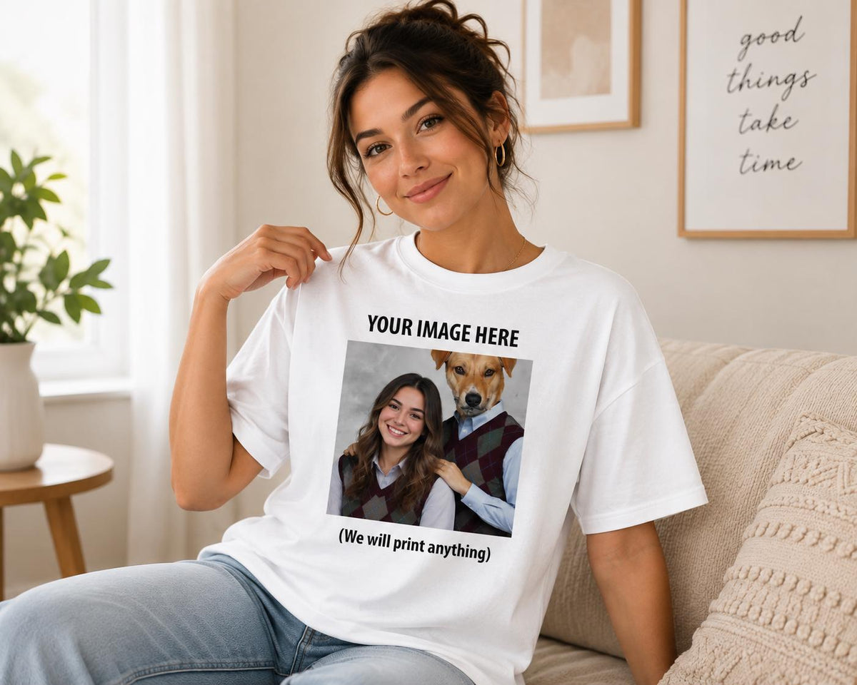 May include: A white short-sleeved t-shirt featuring a custom graphic print on the chest. The print includes the text "YOUR IMAGE HERE" above a photograph of a person and a dog wearing matching argyle vests, with the text "(We will print anything)" below.