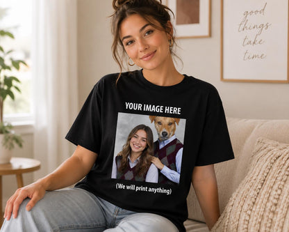 May include: A black short-sleeved t-shirt featuring a central graphic print. The print displays a photograph of a person and a dog wearing matching argyle sweater vests, with the text "YOUR IMAGE HERE" above and "(We will print anything)" below.