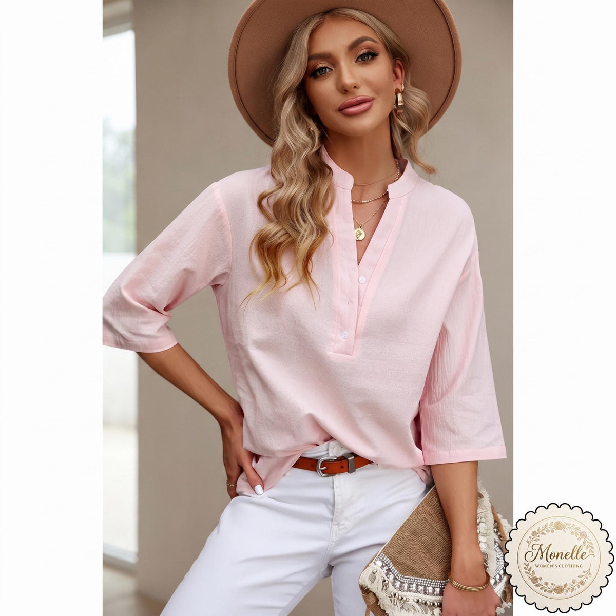 May include: A light pink, long-sleeved blouse with a mandarin collar and a partial button-down front placket. The shirt is paired with white pants and a brown belt with a silver buckle. A tan wide-brimmed hat is worn on the head.