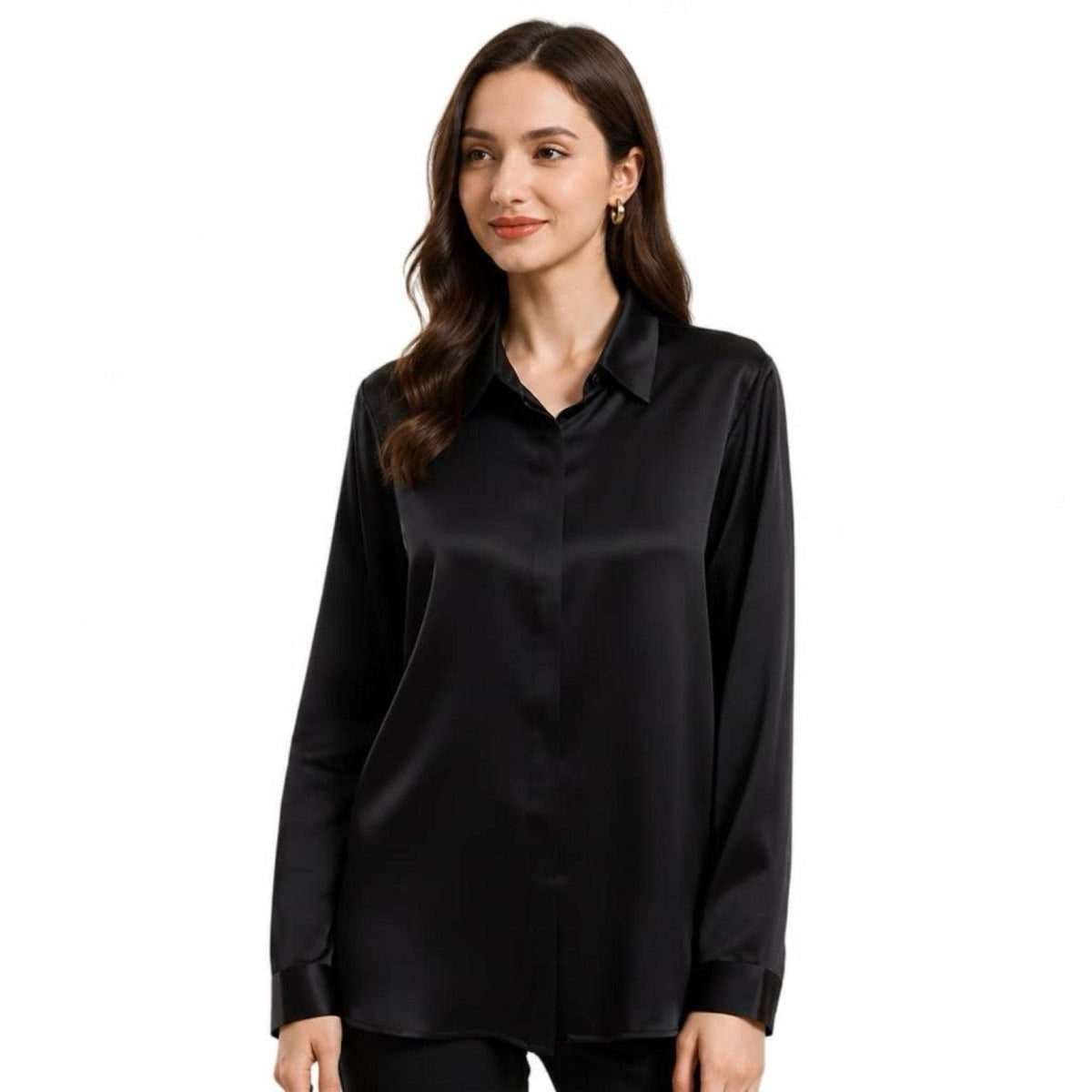 May include: A long-sleeved button-down shirt in a solid black color with a smooth, satin-like finish. The shirt features a classic pointed collar, a concealed front button placket, and structured cuffs at the wrists, providing a clean, uniform appearance.