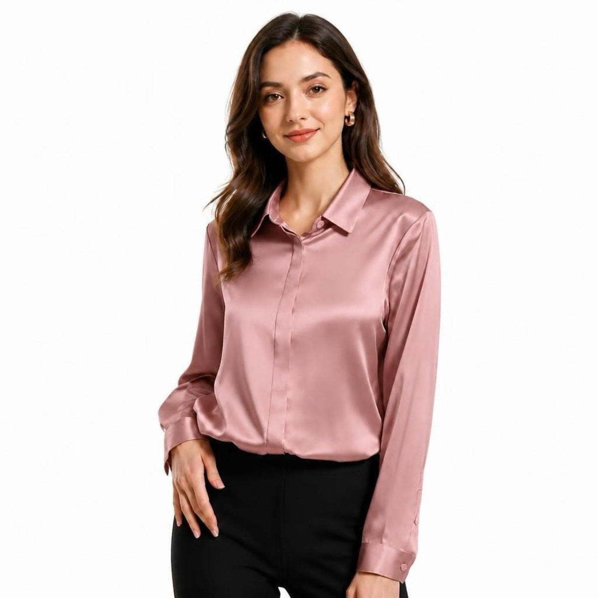 May include: A long-sleeved button-down shirt in a dusty rose pink color with a smooth, satin-like finish. The shirt features a classic collar, a front button placket, and cuffed sleeves, paired with solid black trousers.