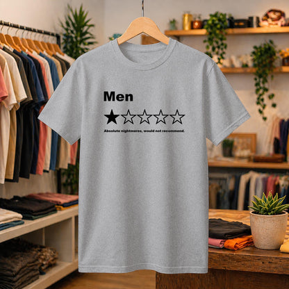 May include: A heather gray short-sleeve t-shirt featuring the black text "Men" above a single solid black star followed by four empty star outlines, with the text "Absolute nightmares, would not recommend." printed in black below the stars.